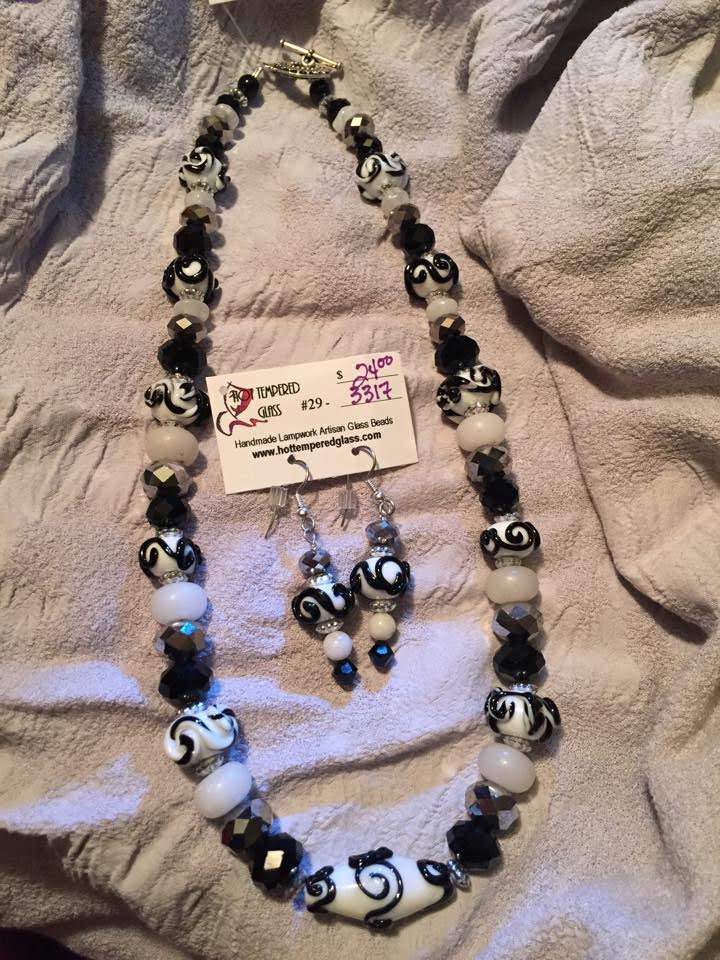 Handmade glass beaded jewelry set, necklace and earrings in black and white.