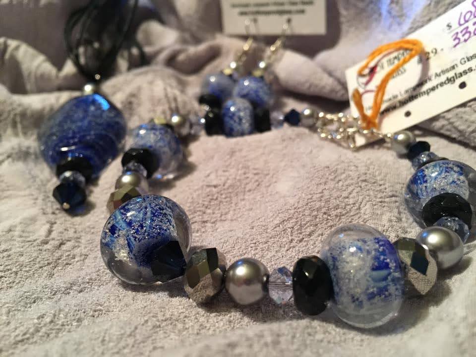 Handmade glass blue and silver swirls jewelry, bracelet, pendant and earrings.
