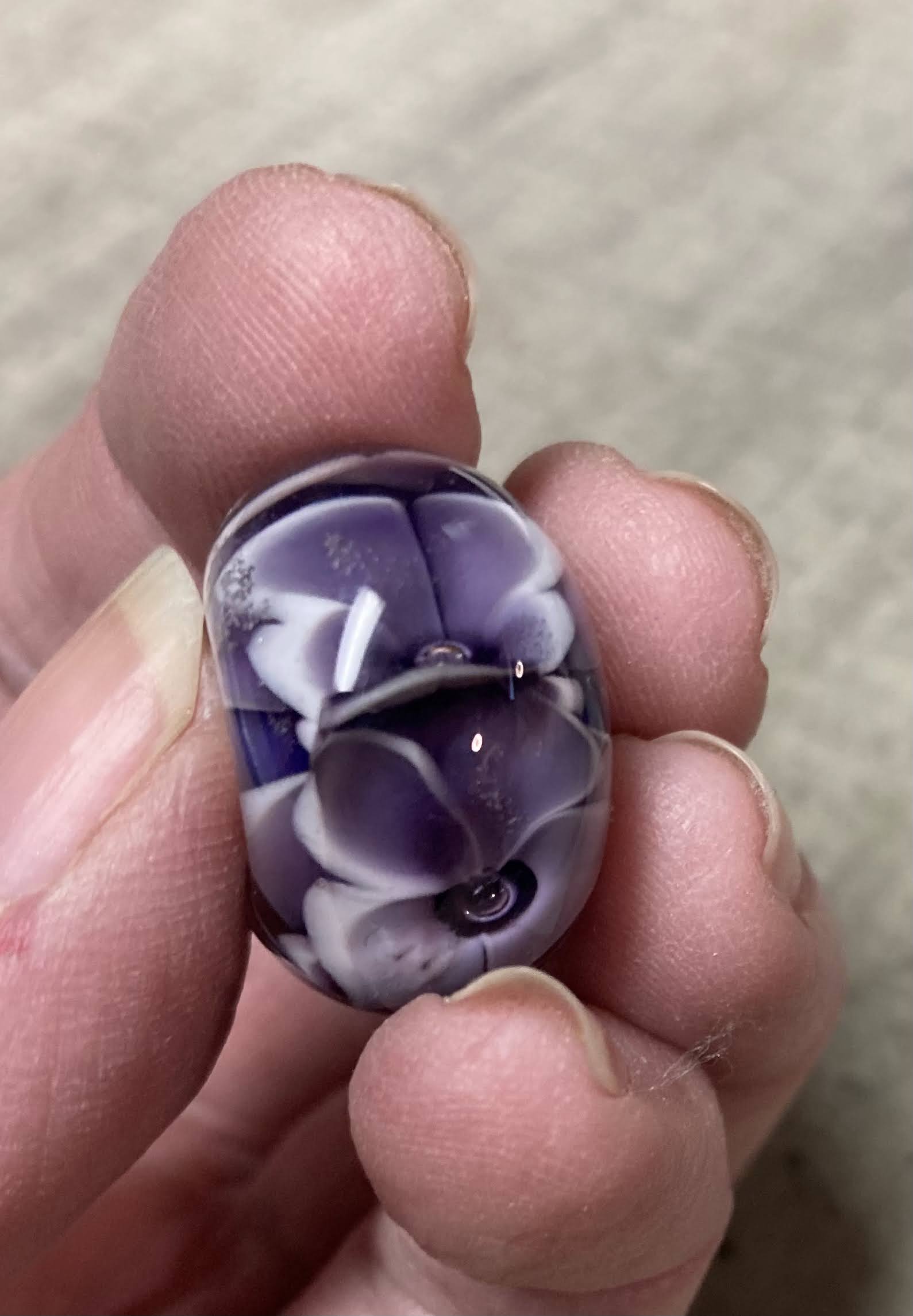 Handmade encased floral glass bead