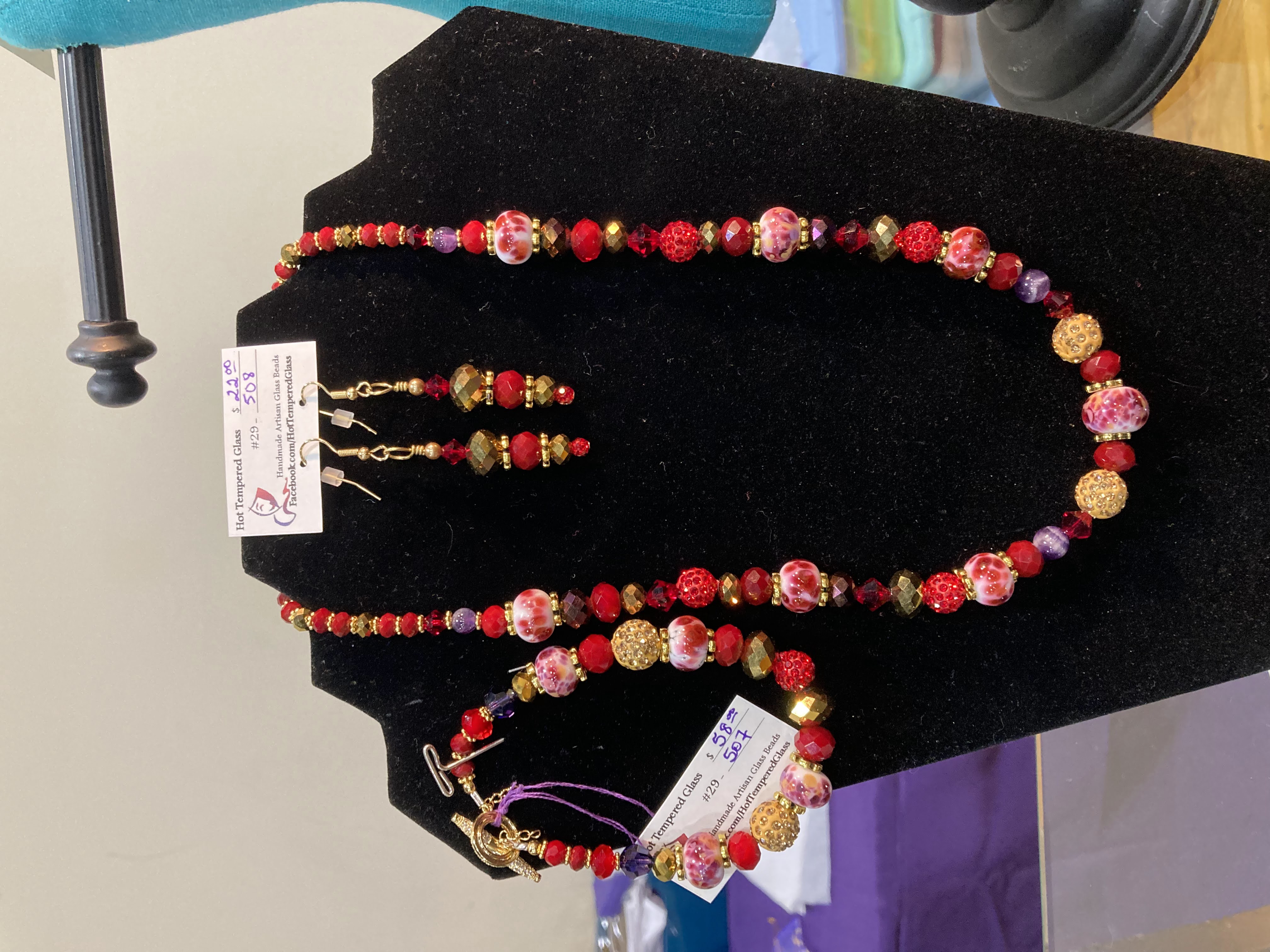 Handmade glass beaded necklace, bracelet and earrings.
